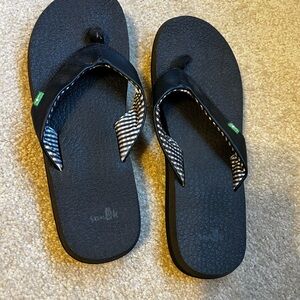 Sanuk Black Flip Flops with Striped Lining